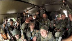 Російські найманці прямують у Донецьк у вантажівці