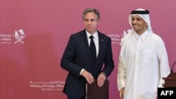 وزرای خارجه امریکا و قطر. عکس از آرشیف جنبه تزیینی دارد