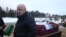 Wagner founder Yevgeny Prigozhin attends the funeral of one of his fighters in December.  "Вагнер" басшысы Евгений Пригожин жауынгерін жерлеу рәсімінде. 2022 жылғы желтоқсан.