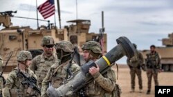 Илустрација - американски војници со „џавелини„