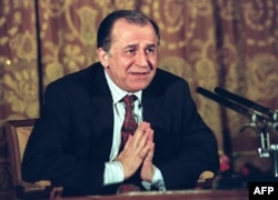 Iliescu speaks to the press in Bucharest on July 20, 1990, one month after he was sworn in as president.