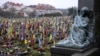 The Lychakiv Cemetery in Lviv is filled with Ukrainian flags and portraits of young soldiers.