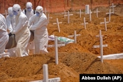 Либерия, похороны погибшего от вируса Эбола, 11 марта 2015 года