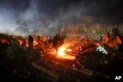 Migranți, în Bealrus, așteptând o șansă să trecă în Polonia și implicit în UE.