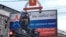 Пропагандистский билборд в поддержку российских военных в Керчи