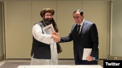 Главы госэнергохолдинга «Барки Точик» (справа) и афганской энергокомпании Da Afghanistan Breshna Sherkat 