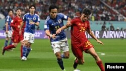 گوشه یی از بازی فوتبال میان تیم های جاپان و اسپانیا در قطر 