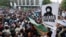 Supporters of the banned Islamist political party Tehrik-e Labaik Pakistan demand the release of their leader and the expulsion of the French ambassador over cartoons depicting the Prophet Muhammad in Karachi on October 24.