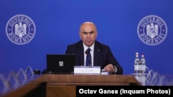 Premierul Ilie Bolojan spune că va reduce o serie de cheltuieli publice. 