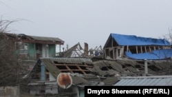 Пошкоджені будинки в Очакові