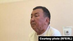 Жээнбек Олжотоев.