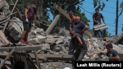 Наслідки російських ракетних ударів по Харкову (фотосвідчення)