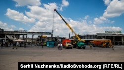 Последствия ракетного удара по ТЦ в Кременчуге