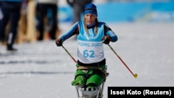 Кацярына Шасьціна-Комар падчас трэніроўкі на Алімпіядзе-2022. Сёньня яна ўваходзіць у асноўны склад зборнай Беларусі ў лыжным спорце і біятлёне. На гэтыя віды спорту рашэньне МПК не распаўсюджваецца