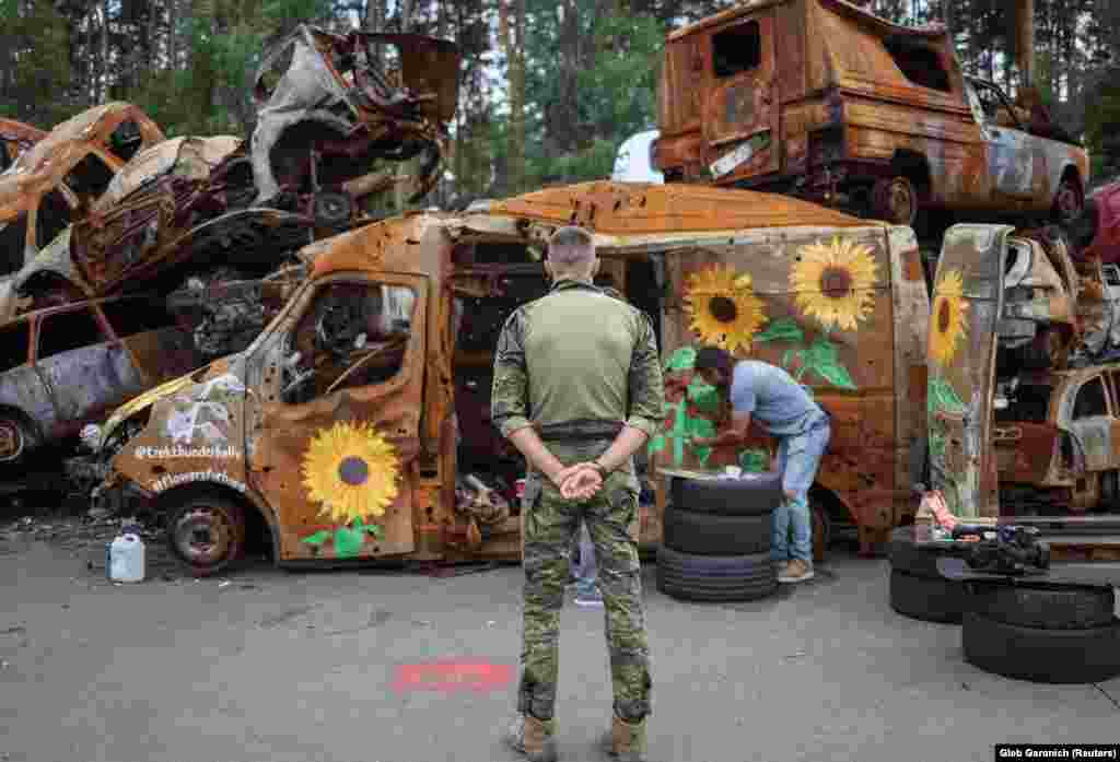 Trek Kelly, a Los Angeles-based muralist, and Olena Yanko, a Ukrainian artist involved in the project, say they respect the concerns but hope the site will become a place for reflection. "Yes, there are people who didn&rsquo;t understand us. They think that we are dancing on the graves of those who died," Yanko says. "But we want to show that...life will go on. We will win [the war] and we can beat the enemy, whether it&rsquo;s with a paintbrush or with weapons."