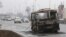 Сгоревший автобус на дороге в Алматы
