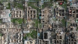 Imagine cu blocurile distruse în Irpin, lângă Kiev. Fotografie realizată cu drona pe 29 aprilie 2022. REUTERS/Valentyn Ogirenko 