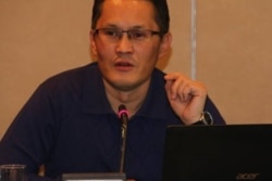 Айбар Султангазиев.