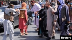 تصویر آرشیف: عملکرد طالبان در برابر زنان و مردم 