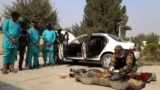 Afghan security officials showed journalists three alleged would-be suicide bomb attackers in the eastern city of Jalalabad on October 31.
