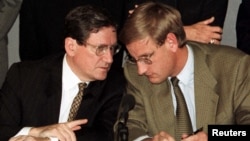 The architect of the Dayton peace accords, Richard Holbrooke (left), chats with Carl Bildt, head of the OSCE mission in Bosnia-Herzegovina, in Sarajevo in September 1996.
