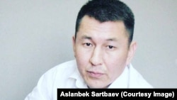 Асланбек Сартбаев.