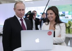 Vladimir Putin și Margarita Simonian, imagine de arhivă