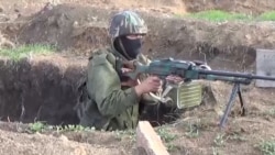 Zeci de combatanți din grupări neonaziste rusești luptă în Ucraina