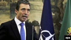 NATO leader Anders Fogh Rasmussen warned that attacks on civilians could be "crimes against humanity."