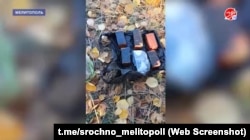 Скриншот из российского телесюжета о задержании Виктора Азаровского, Олега Шокола и Дениса Василика