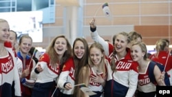 The Russian Olympic team was in a festive mood amid signs of a softening in the doping bans on some athletes ahead of the Rio Olympics.