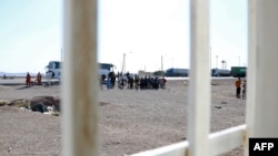 له ایرانه تازه ایستل شوي افغان کډوال چې افغانستان ته استول شوي دي.