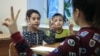 School classes for children of Central Asian migrants in Russia. 