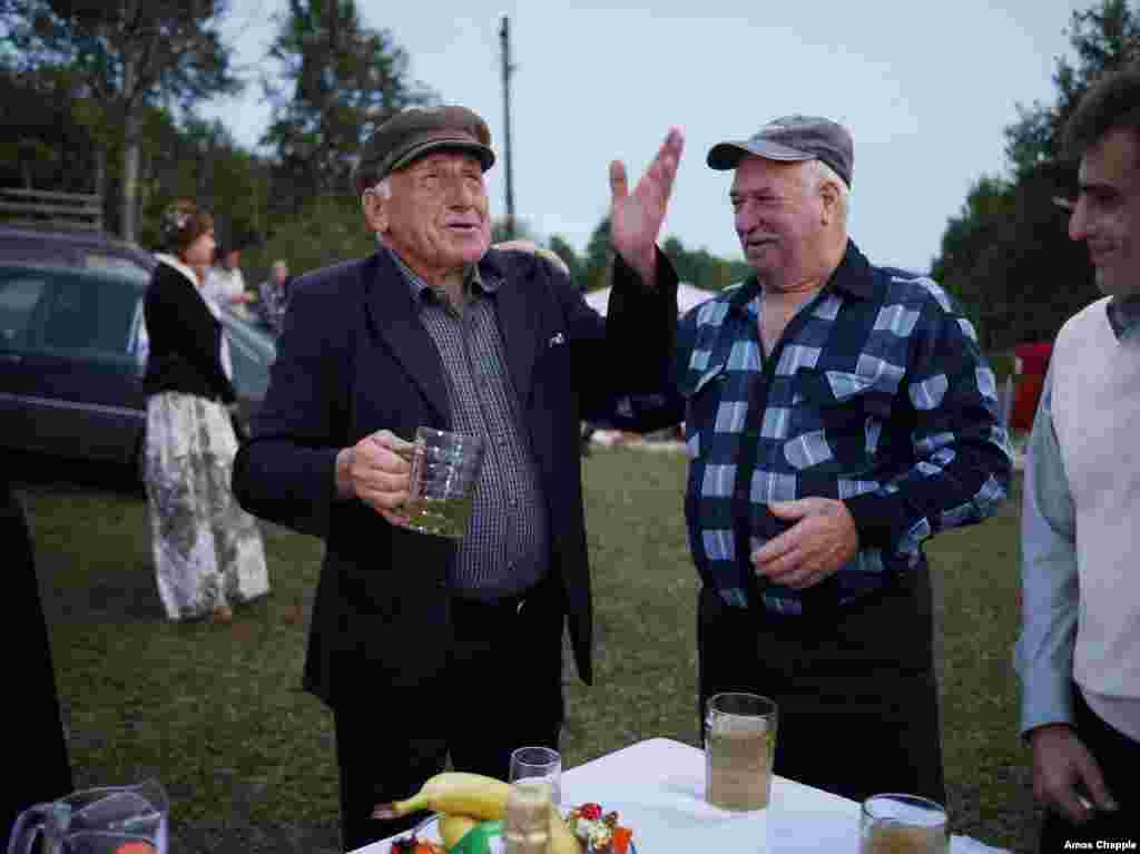 A man raises a toast to God before polishing off his homemade wine. Abkhazia is one of the world's oldest wine-producing regions, but international isolation means the exports are almost completely limited to the Russian market.