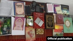 “Хизб ут-Тахрир” экстремисттик тобунун мүчөлөрүнөн алынган материалдар.