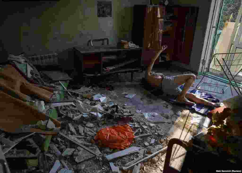 Volodymir lies injured on the floor of his home after it was struck by shelling in Kramatorsk. According to Ukraine's regional governor of Donetsk, the missile strike in a residential area of Kramatorsk killed at least one person and injured six others. "This is a deliberate attack on civilians," Pavlo Kyrylenko said, adding that it would continue until the Russians were apprehended.