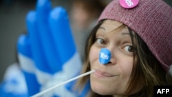 Scottish independence supporters gather outside Usher Hall ahead of the "A Night for Scotland" concert in Edinburgh, Scotland, on September 14.