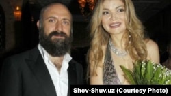 Гульнара Каримова с турецким актёром Халитом Эргенчем, который посетил Узбекистан в качестве почётного гостя фестиваля моды Style.uz в Ташкенте, 8 октября 2012 года