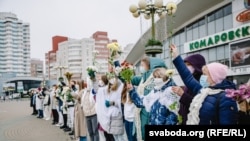 A group of women form a chain of solidarity in Minsk with anti-government protesters on November 9.