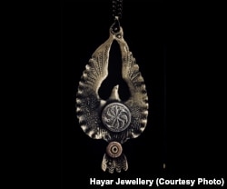 A bird fashioned from bullets