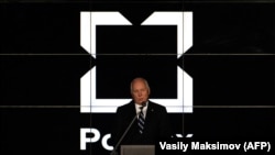 Rostec CEO Sergei Chemezov speaks during a presentation of the new logo of the Kalashnikov company in Moscow in December 2014
