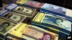 Iran's national currency has tumbled to record lows in value against the US dollar.