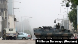 Түндө Харареден атылган октун жана жарылуулардын үндөрү угулуп турду.