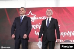 Artur Vanetsian (left) appears with ex-President Serzh Sarkisian at a party rally earlier this month.
