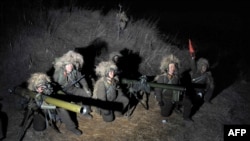 Түндүк кореялык аскерлер. Иллюстрациялык сүрөт.