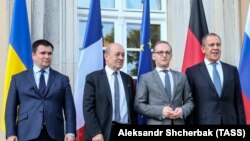 Очільники міністерств закордонних справ України, Франції, Німеччини та Росії – Павло Клімкін, Гайко Маас, Жан-Ів Ле Дріан і Сергій Лавров (зліва направо), Берлін, 11 червня 2018 року