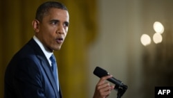 U.S. President Barack Obama speaks during a press conference in the East Room of the White House on November 14.