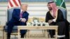 US President Donald Trump and Saudi Crown Prince Muhammed Bin Salman talk before a coffee ceremony at the Royal Court in Riyadh on May 13.