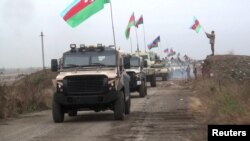 Азербайжан аскерлери Тоолуу Карабактагы Агдам районуна кирип келүүдө. 2020-жылдын 20-ноябры.