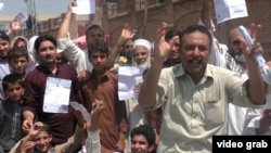 FILE: A protest in Peshawar against a hike in electricity prices.